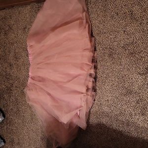 Cute Pink tulle skirt. Fits size Med-XXL